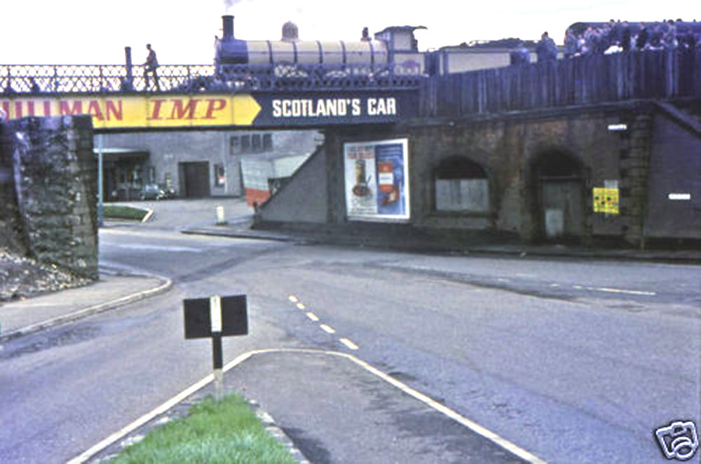 GW Robin Jones Goods stands at Ferguslie station with the Scottish Rambler in April 1965.